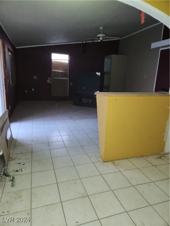 kitchen with fridge and a ceiling fan