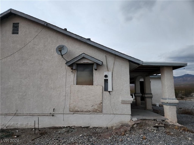 view of home's exterior with stucco siding