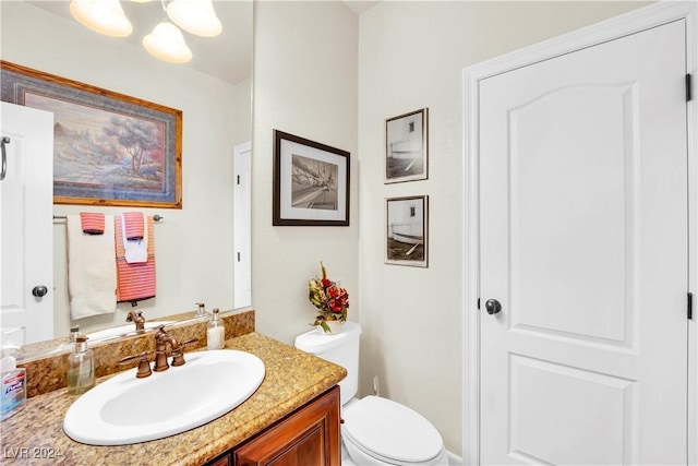 127 Birch Ridge Ave, Las Vegas, NV 89183 - half bathroom featuring vanity and a chandelier
