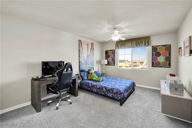 bedroom with ceiling fan and carpet floors