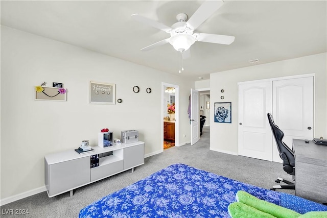 127 Birch Ridge Ave, Las Vegas, NV 89183 - bedroom with carpet floors, a closet, a ceiling fan, and ensuite bathroom