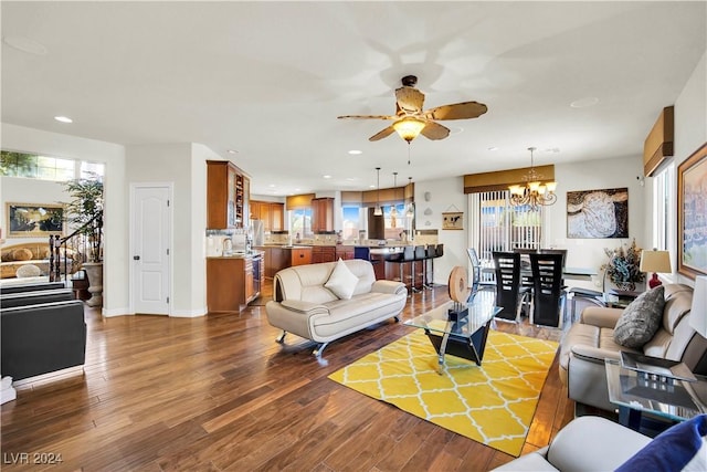 127 Birch Ridge Ave, Las Vegas, NV 89183 - living room featuring ceiling fan, a chandelier, wood finished floors, and recessed lighting