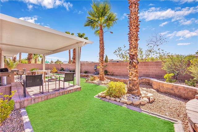 view of yard with a patio area