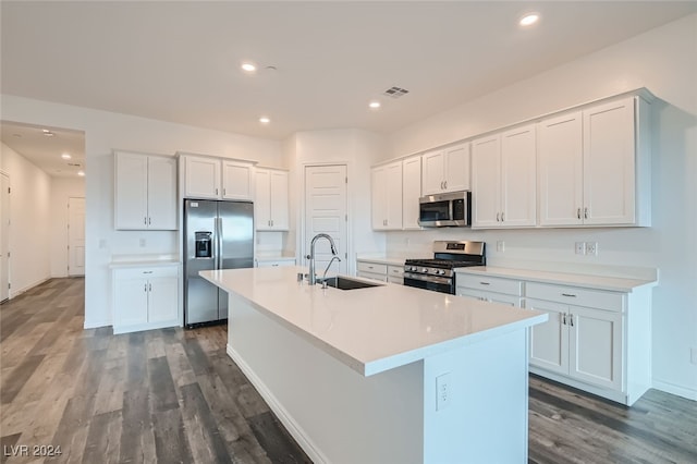 kitchen featuring white cabinets, sink, and appliances with stainless steel finishes