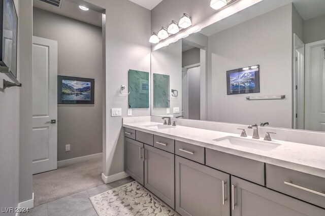 bathroom with vanity and tile patterned floors