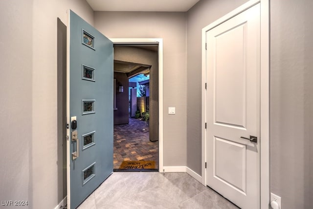 interior space featuring light tile patterned floors