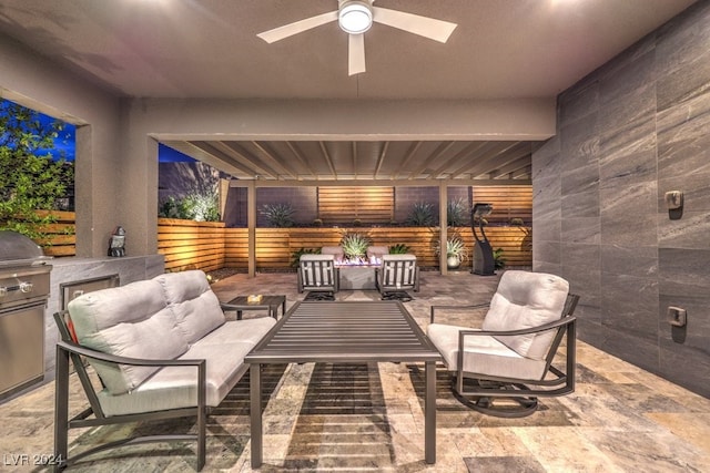 view of patio / terrace featuring area for grilling, ceiling fan, and an outdoor hangout area