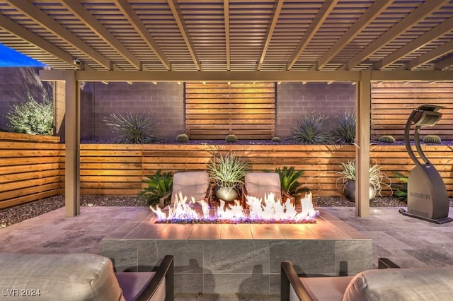 view of patio / terrace featuring a pergola and a fire pit