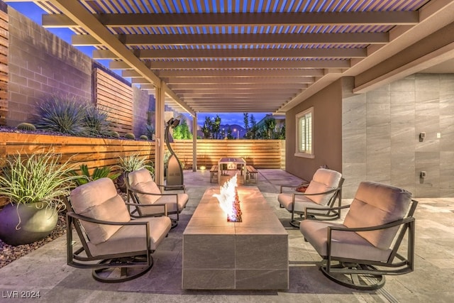 view of patio / terrace featuring a pergola and a fire pit