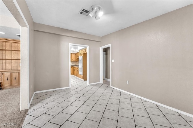 view of tiled spare room