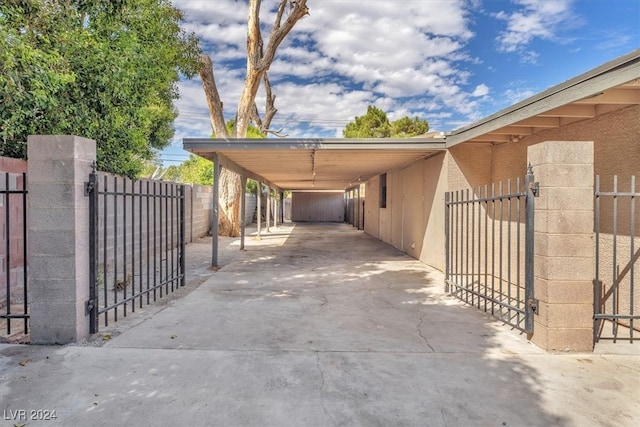 exterior space with a carport