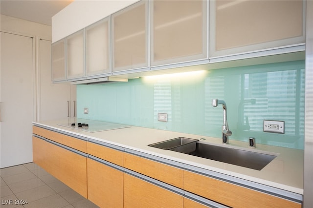 3726 Las Vegas Blvd Unit 2604, Las Vegas, NV 89158 - kitchen with electric stovetop, light countertops, and light tile patterned flooring