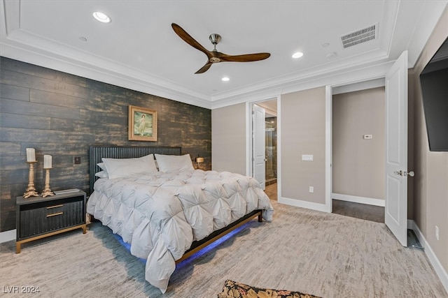 bedroom with ceiling fan and ornamental molding