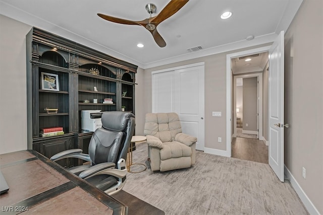 office featuring ceiling fan, hardwood / wood-style floors, and crown molding