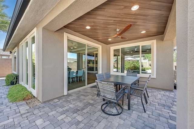 view of patio / terrace featuring ceiling fan