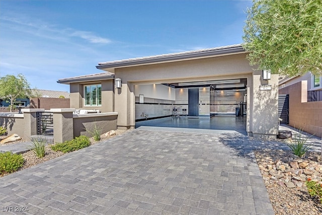 view of front of property with a patio