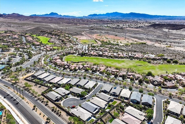 bird's eye view with a mountain view