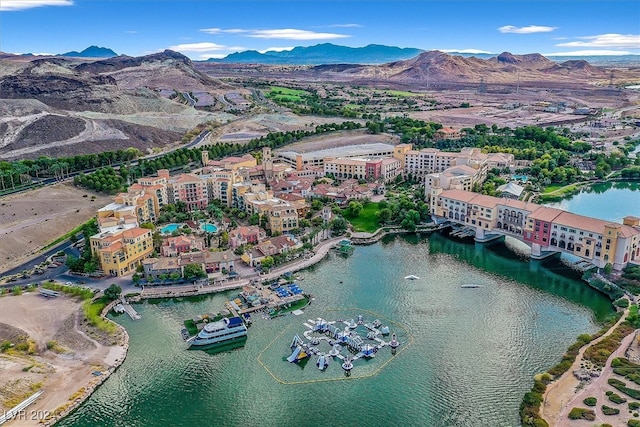 bird's eye view featuring a water and mountain view