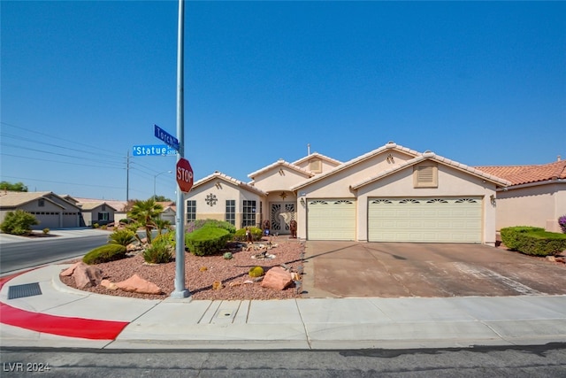 view of front of property with a garage