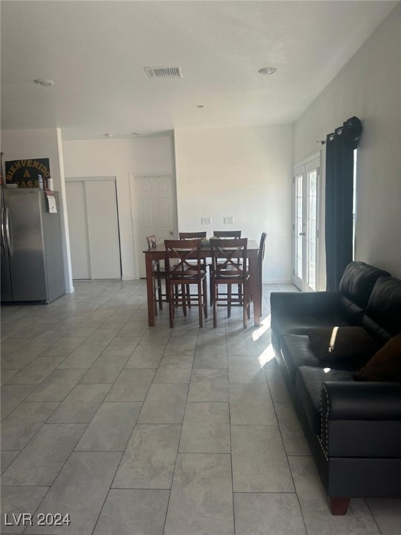 1840 Princeton St, North Las Vegas, NV 89030 - dining room with light tile patterned flooring