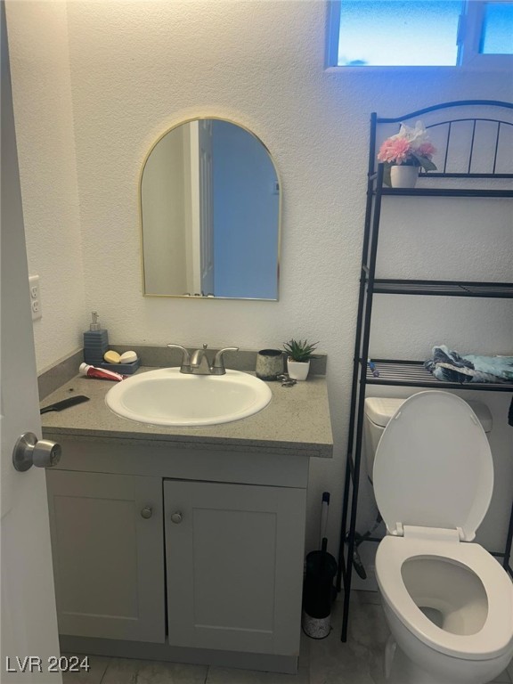 1840 Princeton St, North Las Vegas, NV 89030 - half bath featuring vanity and toilet