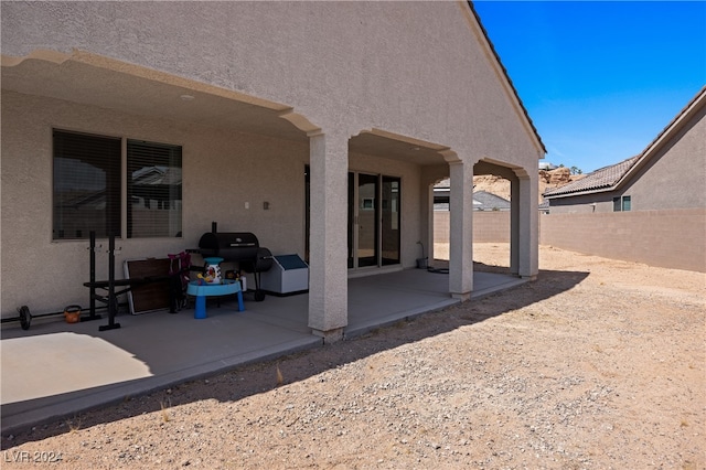 view of patio with a grill