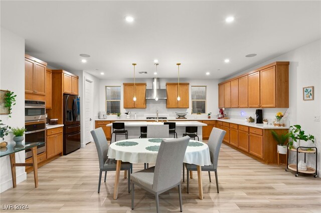 dining room featuring light wood-type flooring