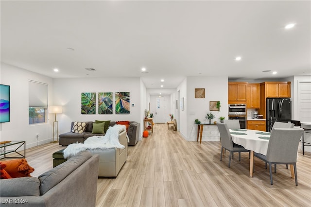 living room featuring light wood-type flooring