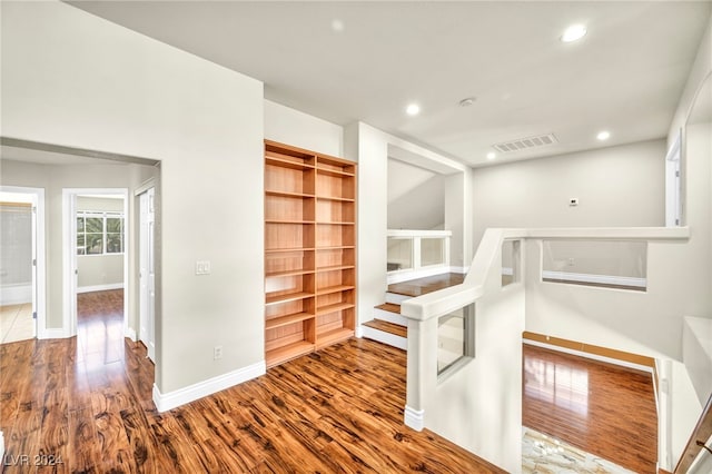 interior space with hardwood / wood-style flooring