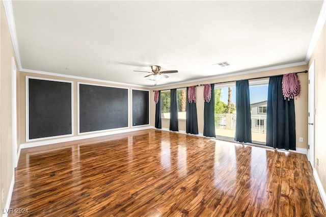 empty room featuring ornamental molding, hardwood / wood-style floors, and ceiling fan