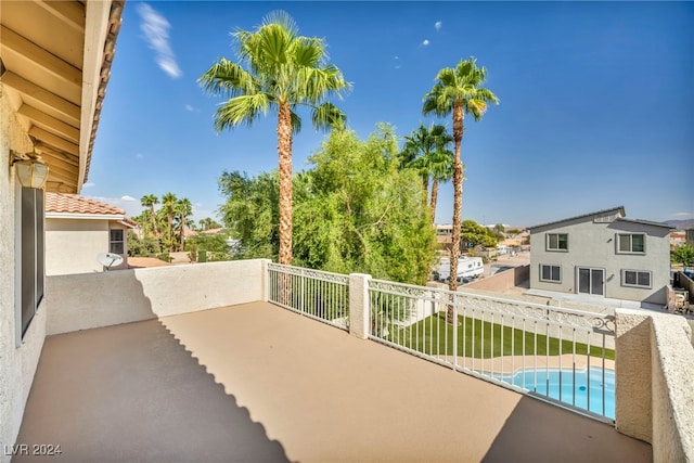 view of patio with a fenced in pool