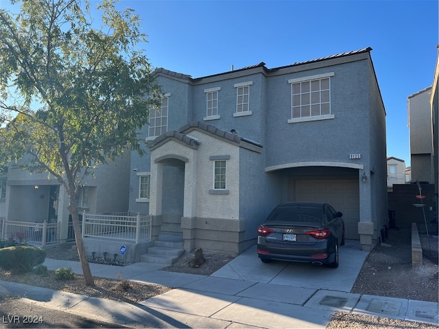 view of front of home with a garage