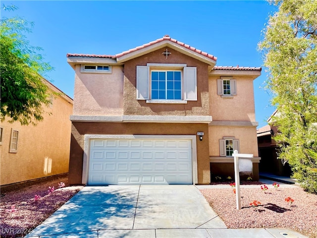 view of front of house with a garage