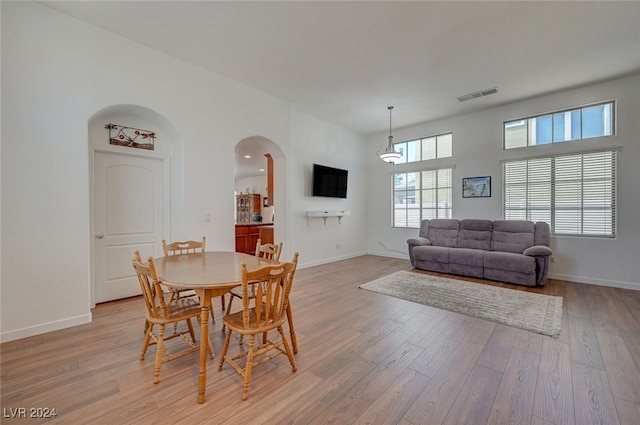 dining room with light hardwood / wood-style flooring