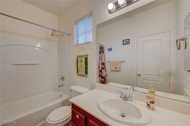 full bathroom with shower / bathtub combination with curtain, toilet, and vanity