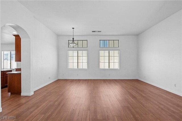 unfurnished room featuring light wood-type flooring