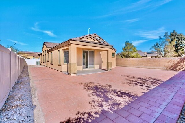 back of house featuring a patio