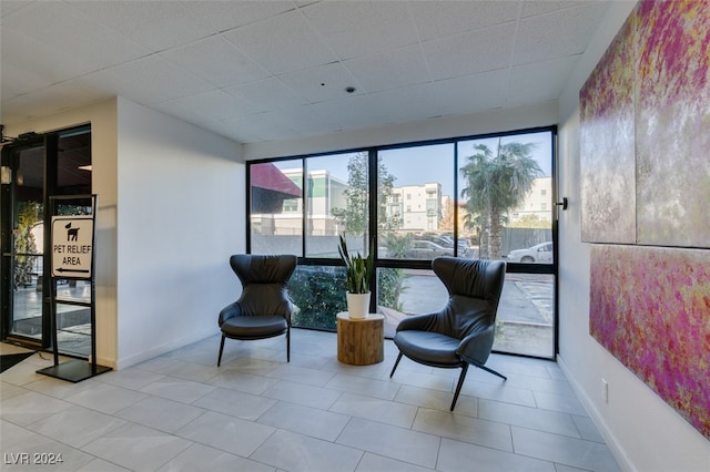 sitting room with light tile patterned flooring