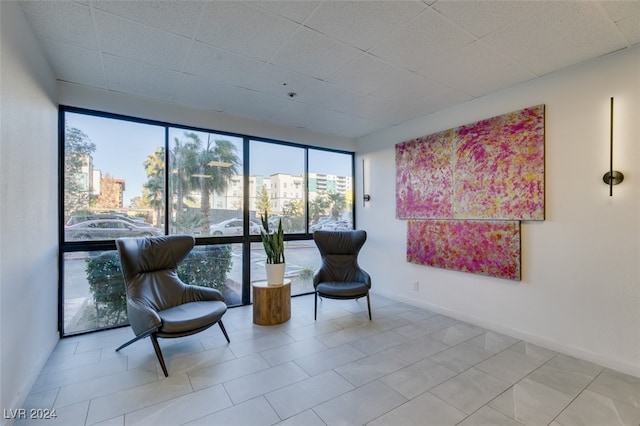 living area featuring tile patterned flooring