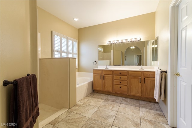 bathroom with vanity and plus walk in shower