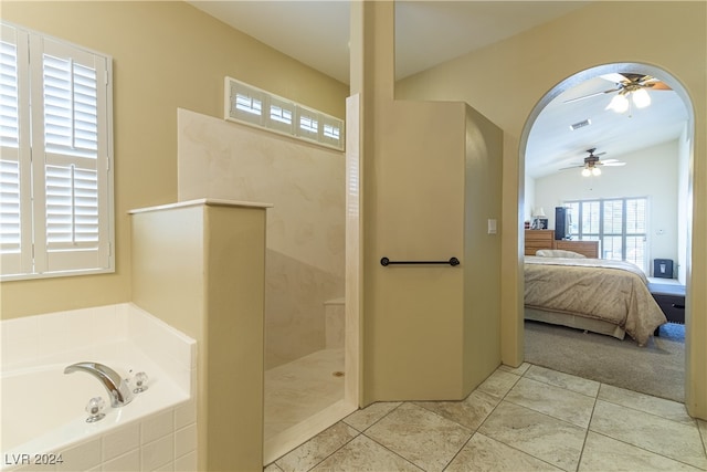 bathroom featuring tile patterned flooring, ceiling fan, and independent shower and bath