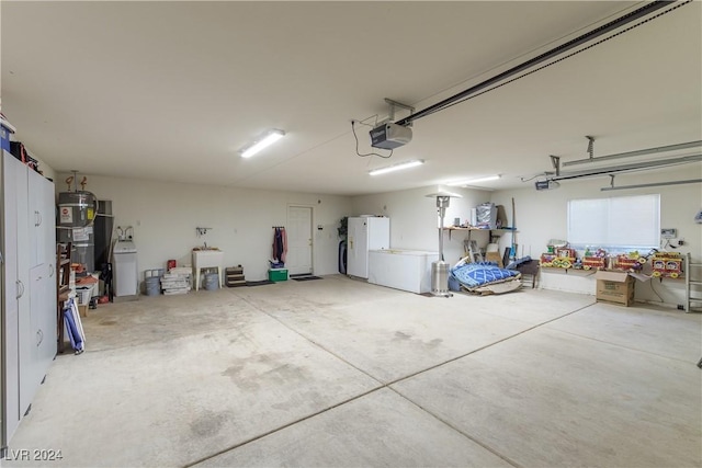 1214 Country Club Dr, Laughlin, NV 89029 - garage featuring secured water heater, white refrigerator with ice dispenser, and a garage door opener