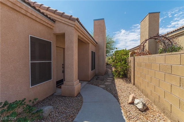 1214 Country Club Dr, Laughlin, NV 89029 - view of home's exterior featuring fence and stucco siding