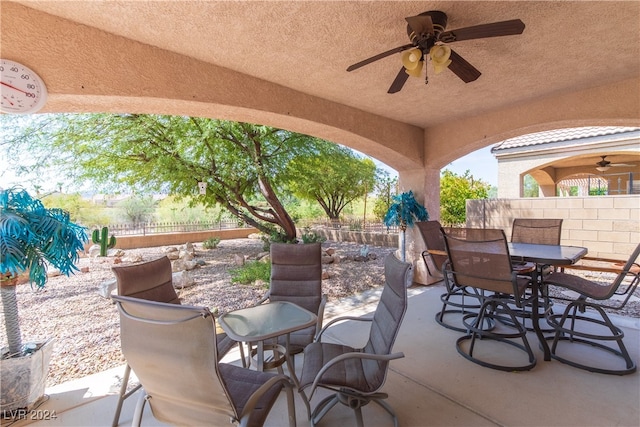 view of patio with ceiling fan