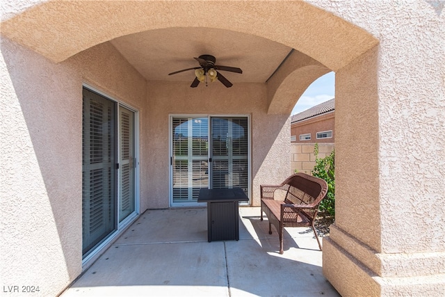 view of patio / terrace featuring ceiling fan