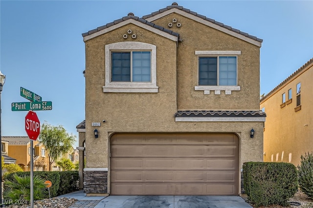 view of front of house with a garage