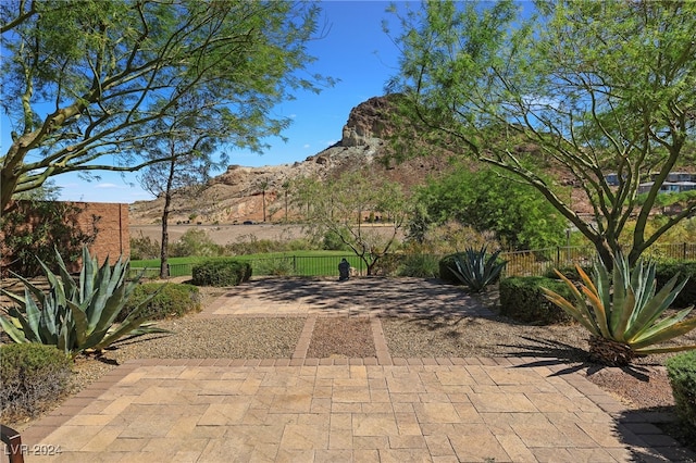 view of patio / terrace with a mountain view