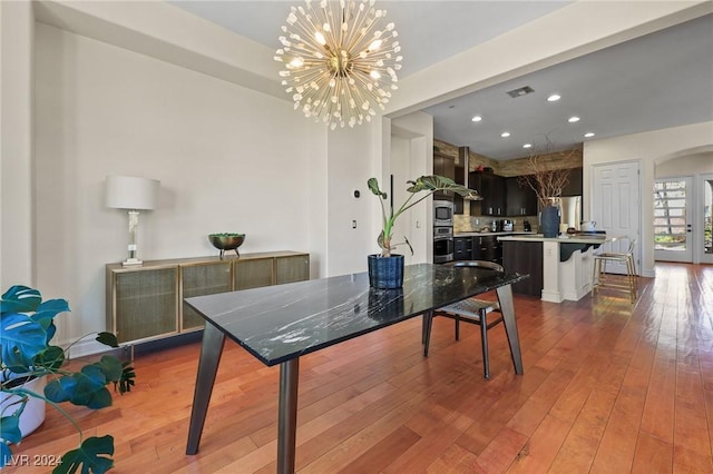 6 Lago Turchino Ct, Henderson, NV 89011 - interior space with an inviting chandelier, arched walkways, visible vents, recessed lighting, and hardwood / wood-style flooring