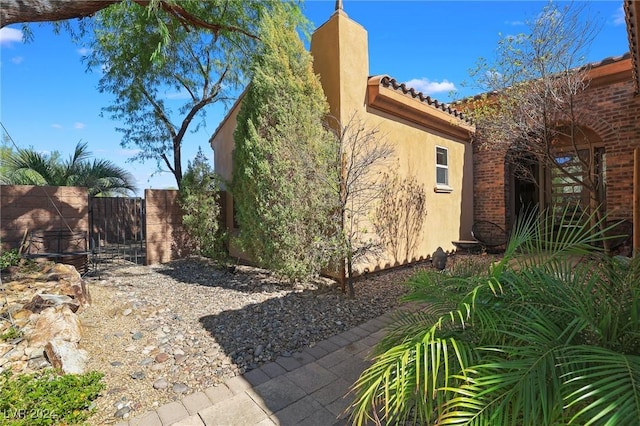 6 Lago Turchino Ct, Henderson, NV 89011 - view of yard featuring fence and a gate