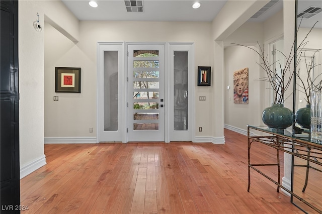 foyer entrance featuring light wood-type flooring